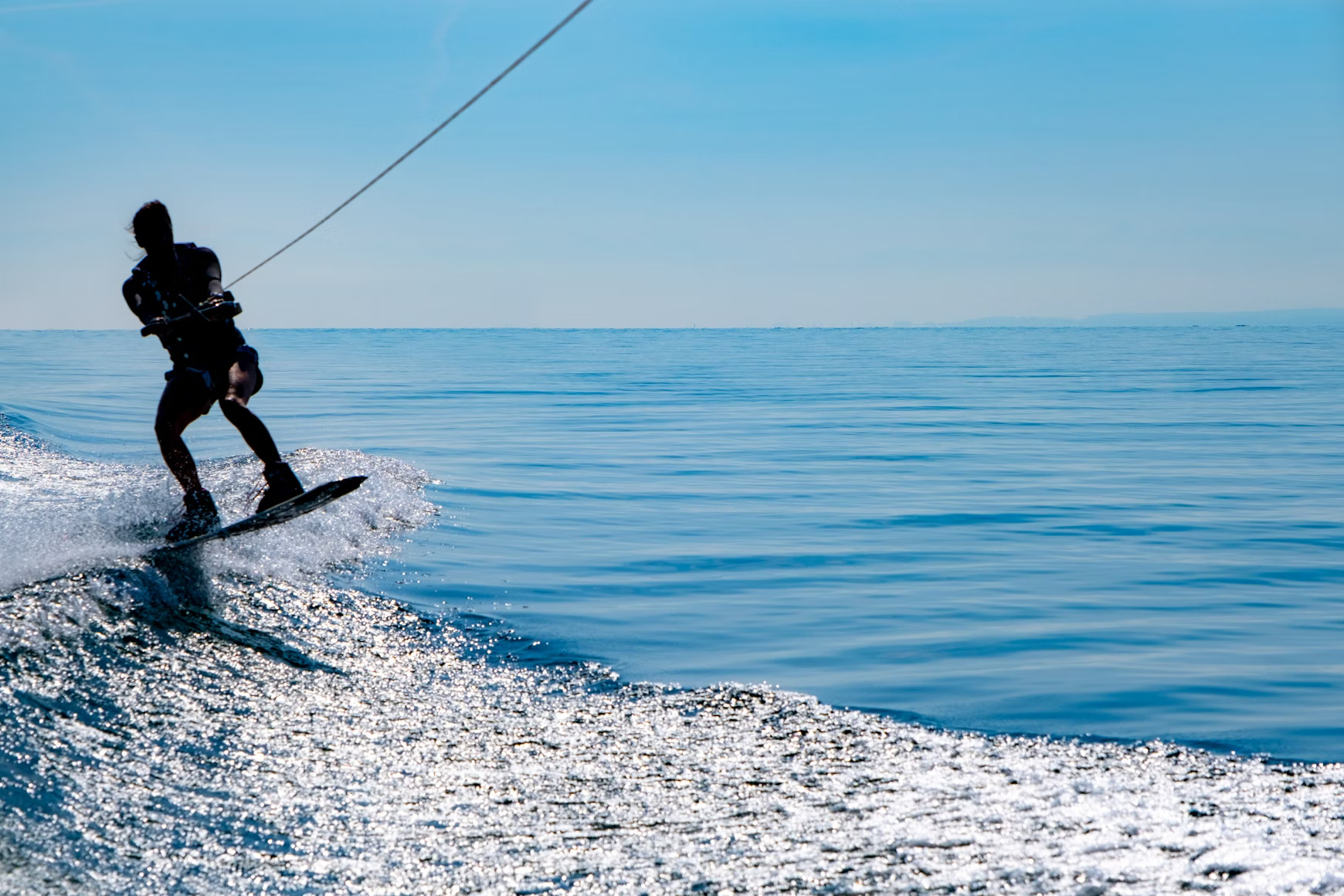 Wakeboard team riding together